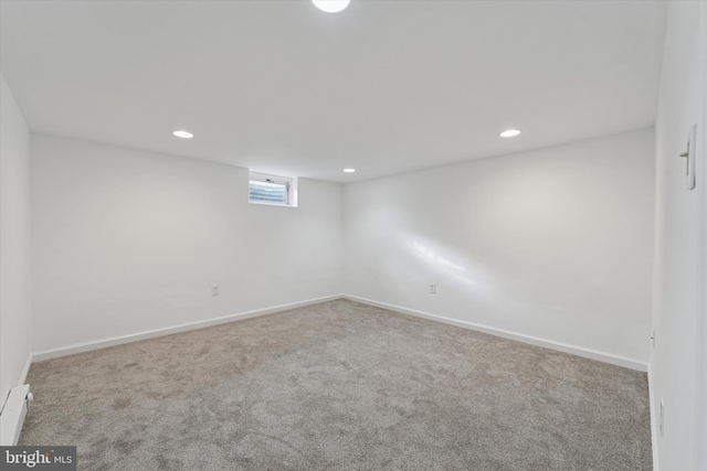 below grade area featuring recessed lighting, baseboards, and carpet floors