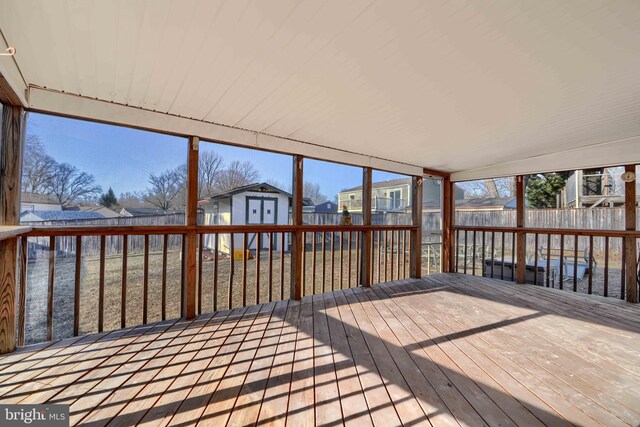 unfurnished sunroom featuring a residential view