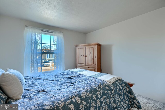 bedroom with a textured ceiling