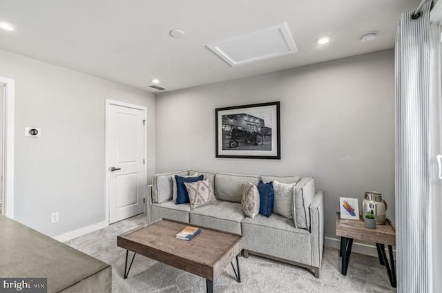 living area featuring visible vents, light carpet, recessed lighting, baseboards, and attic access