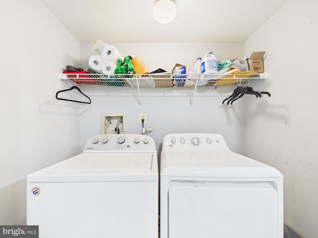 laundry area featuring washer and dryer and laundry area