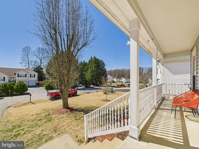 balcony featuring covered porch