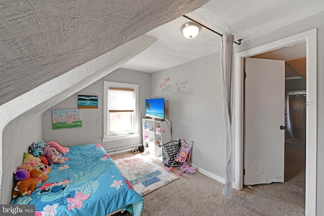 carpeted bedroom featuring a baseboard radiator and baseboards