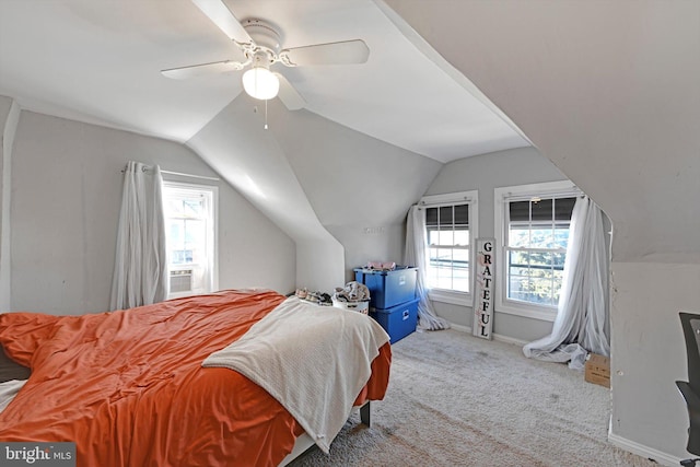 bedroom featuring carpet flooring, ceiling fan, lofted ceiling, and baseboards