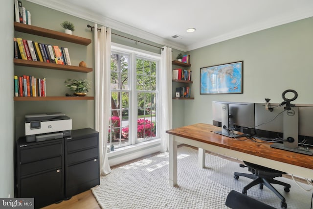 office space featuring ornamental molding and visible vents