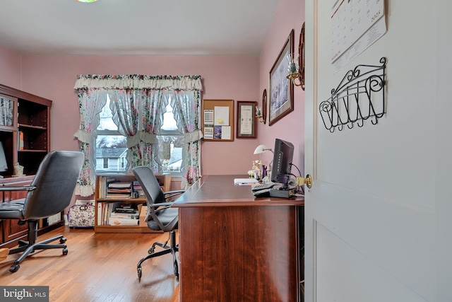 office space with wood finished floors