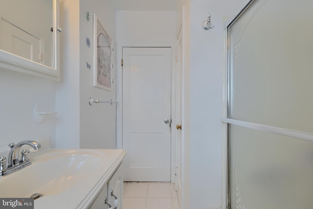 bathroom featuring vanity and tile patterned flooring