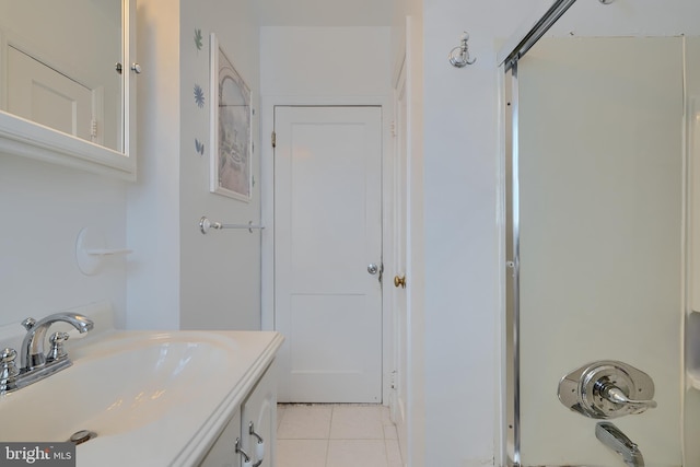 full bath featuring tile patterned floors and vanity