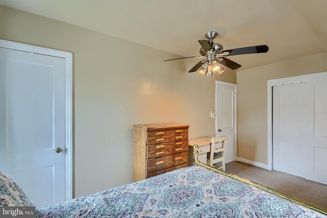 carpeted bedroom featuring a ceiling fan and baseboards