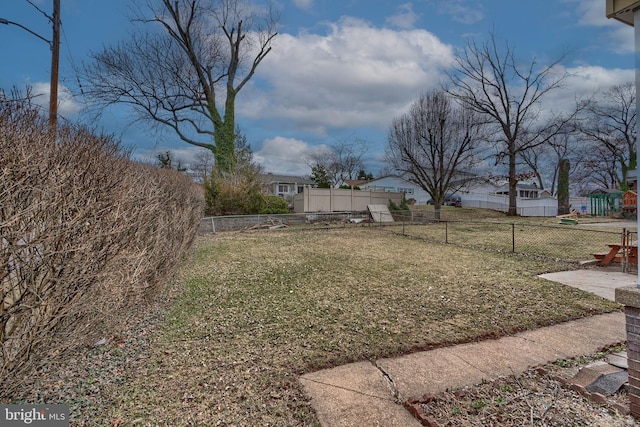 view of yard with fence