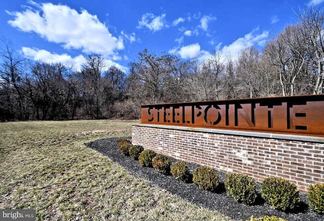 view of community sign