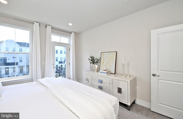 bedroom featuring recessed lighting, baseboards, and light carpet