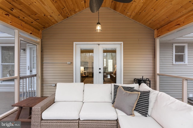 sunroom with french doors, wooden ceiling, and vaulted ceiling