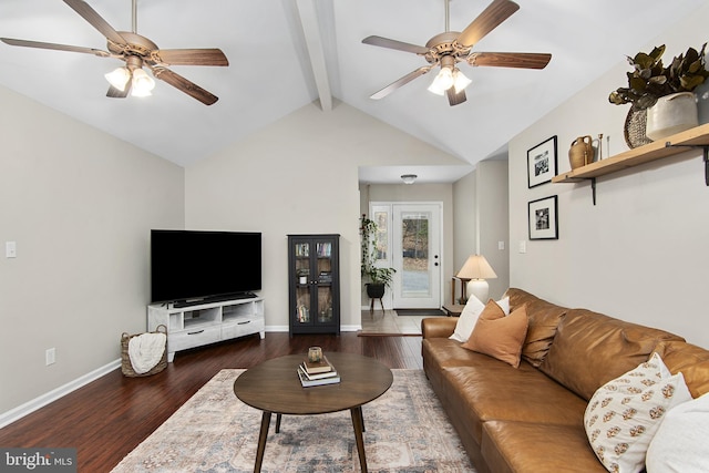 living room featuring ceiling fan, baseboards, wood finished floors, and vaulted ceiling with beams