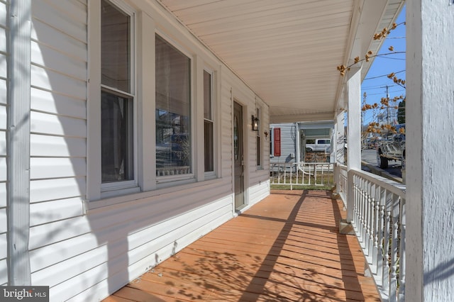 deck featuring covered porch