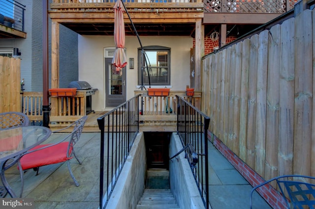 view of patio / terrace with outdoor dining area and grilling area