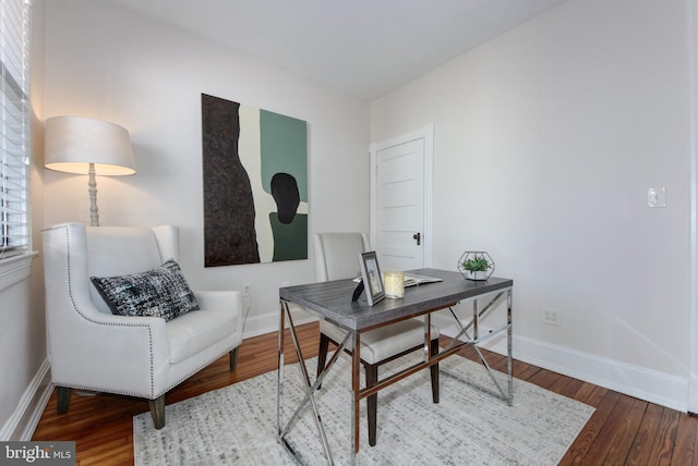 office with baseboards and wood finished floors