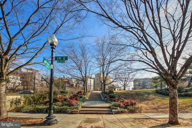 view of property's community featuring stairway