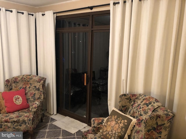 sitting room with tile patterned flooring