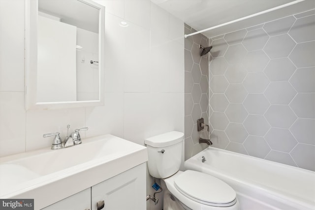 bathroom with vanity,  shower combination, and toilet