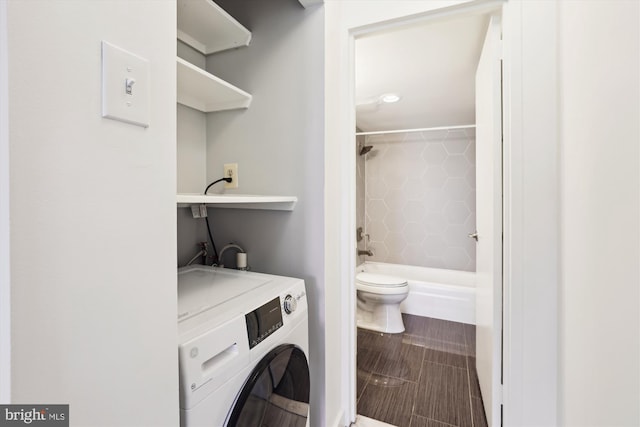 washroom with washer / dryer and laundry area