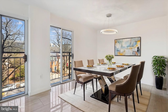 dining room with baseboards