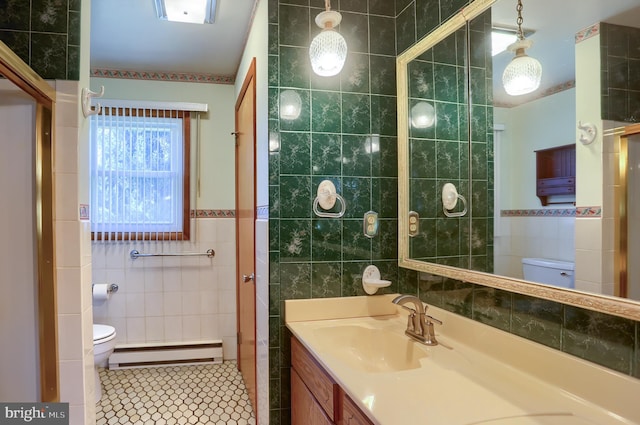 bathroom with tile walls and toilet