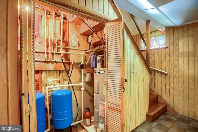 utility room with water heater