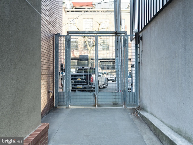 view of exterior entry featuring a gate