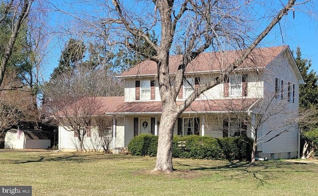 view of front facade with a front yard