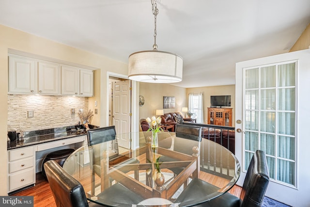 dining room featuring dark wood finished floors