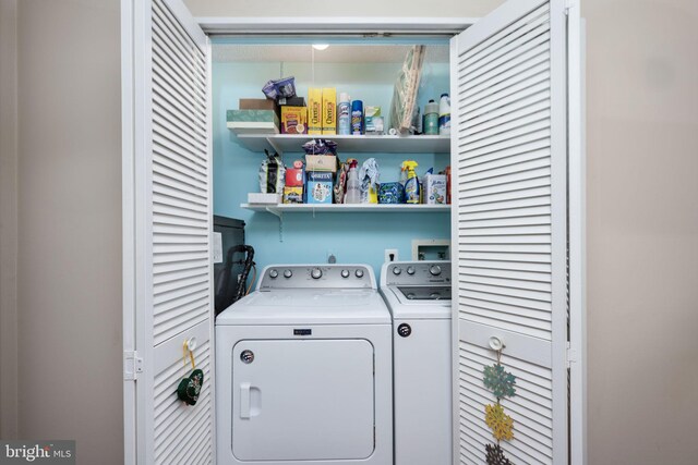 laundry area with laundry area and washing machine and dryer