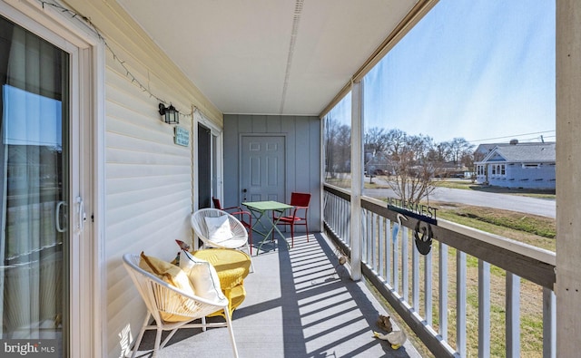 balcony featuring a residential view