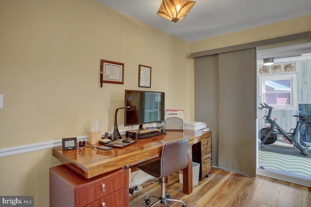 office area with light wood finished floors