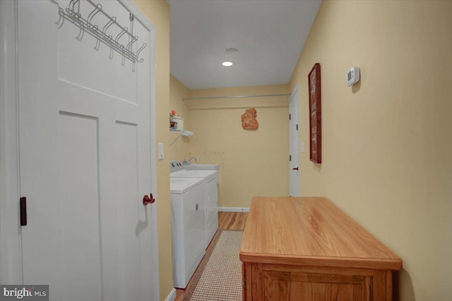 clothes washing area featuring laundry area and washer and dryer