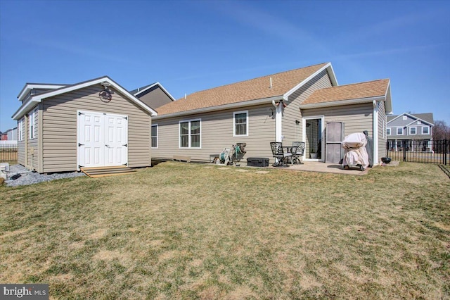 back of property featuring a patio, fence, and a lawn