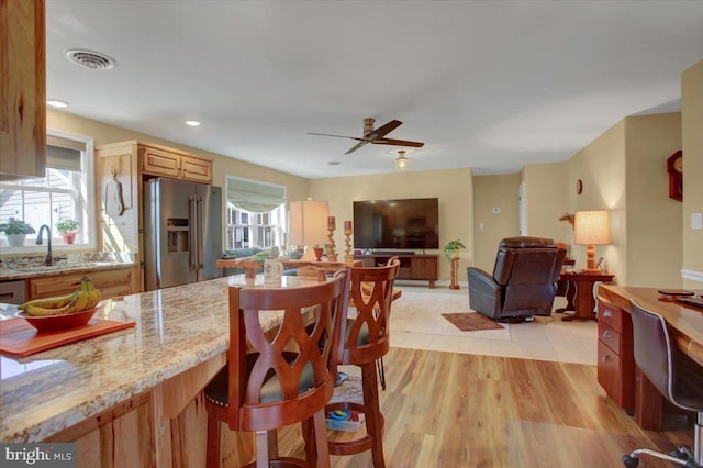 dining room with recessed lighting, visible vents, ceiling fan, and light wood-style floors