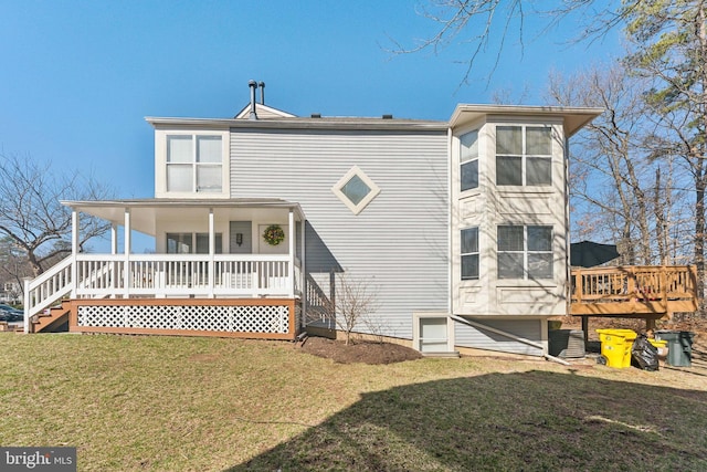 rear view of property with a porch and a yard