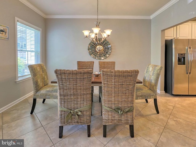 dining area with baseboards, a notable chandelier, and ornamental molding