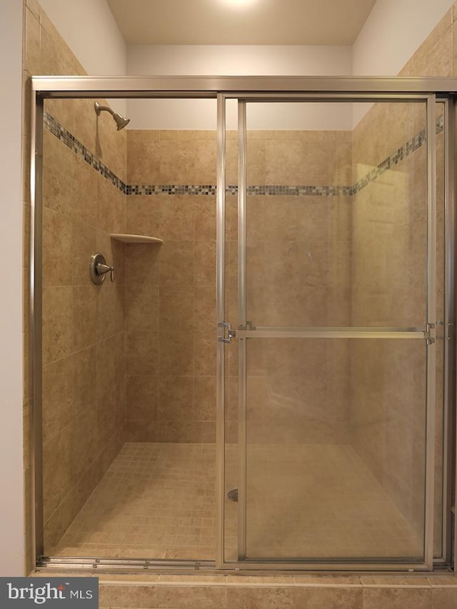 bathroom featuring a stall shower