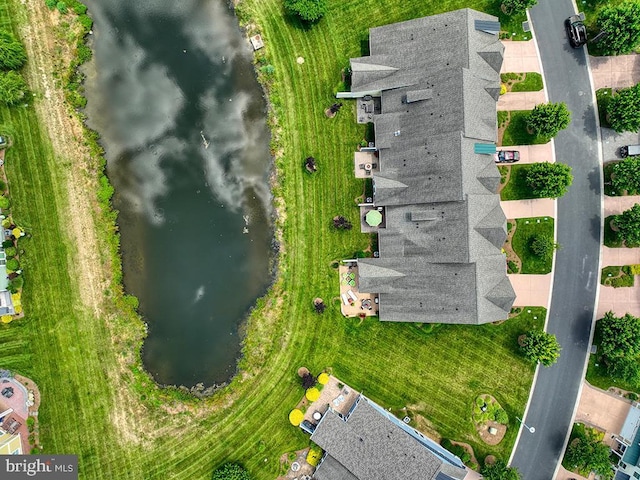 birds eye view of property featuring a water view