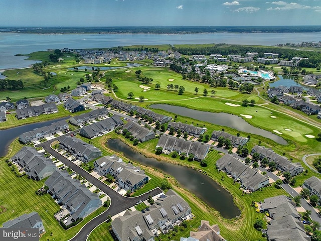 bird's eye view featuring a residential view, view of golf course, and a water view