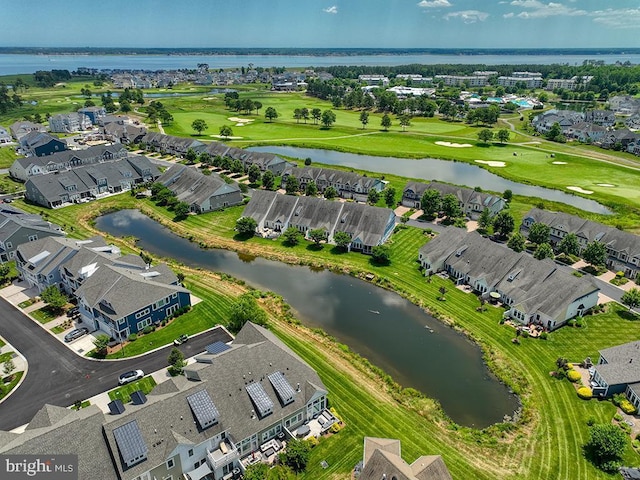 aerial view with a residential view, a water view, and golf course view