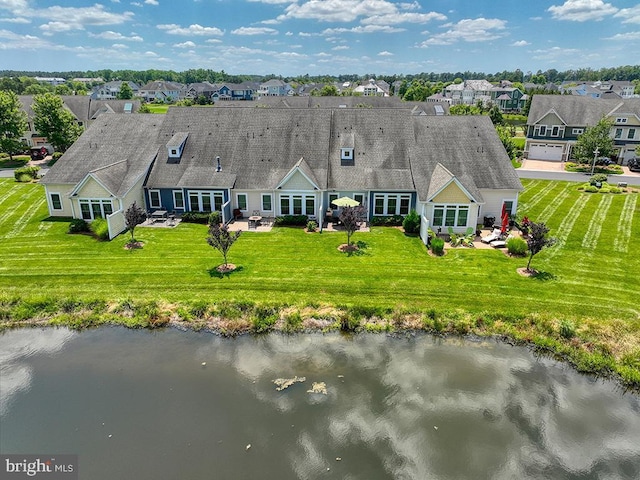 aerial view with a residential view and a water view