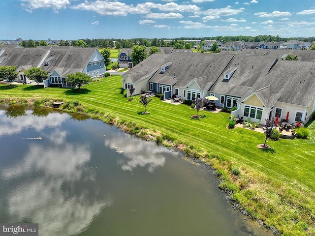 birds eye view of property featuring a residential view and a water view