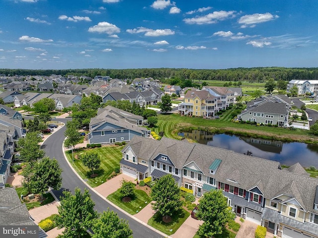 bird's eye view featuring a residential view and a water view