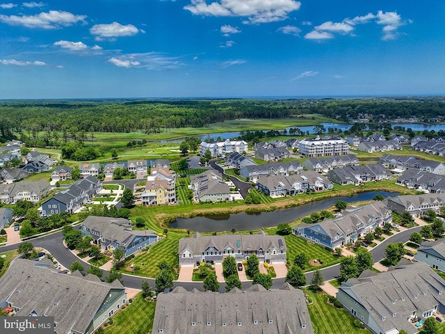 bird's eye view with a residential view and a water view