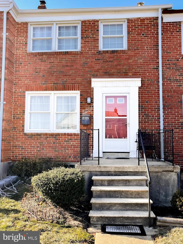 view of front of property with brick siding