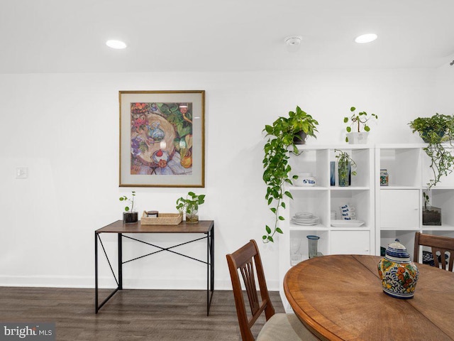 dining space featuring recessed lighting, baseboards, and wood finished floors