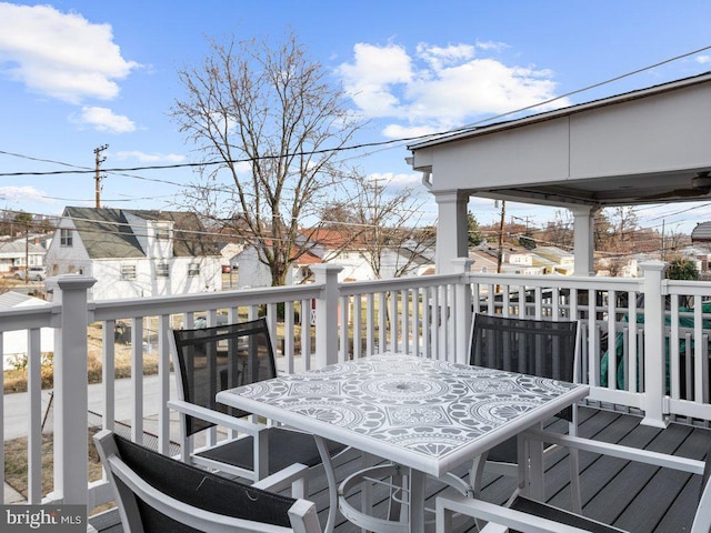 deck featuring outdoor dining area